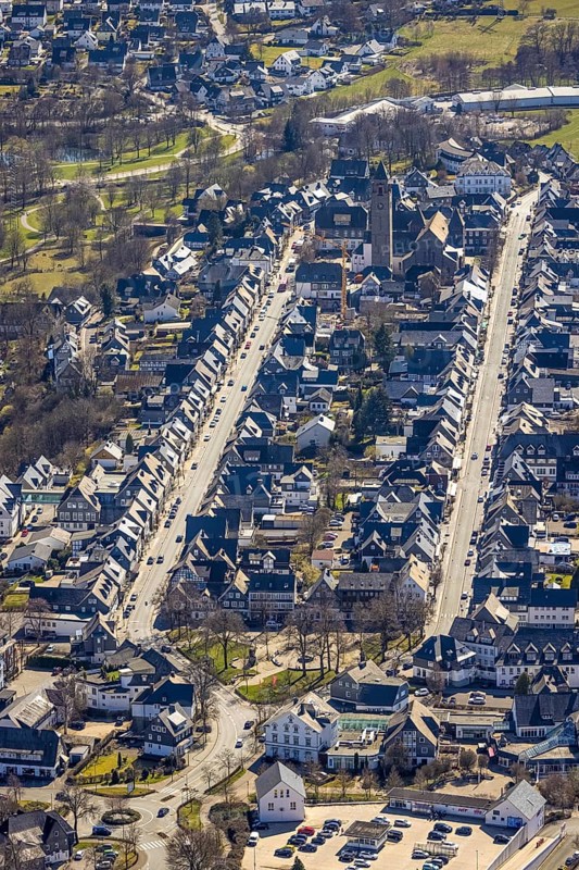 Aerial view, housing estate Weststraße and Oststraße Parallele, St.-Alexander-Kirche, Schützenplatz, Schmallenberg, Sauerland, North Rhine-Westphalia, Germany, place of worship, DE, Europe, religious community, place of worship, property tax, holy place, real estate, church, parish, denomination, aerial photograph, aerial photography, aerial photography, parallel streets, religion, religious site, overview, bird's-eye view, residential area, living and life, residential area, residential buildings, quality of life, residential neighbourhood, housing estate, birds-eyes view, overview