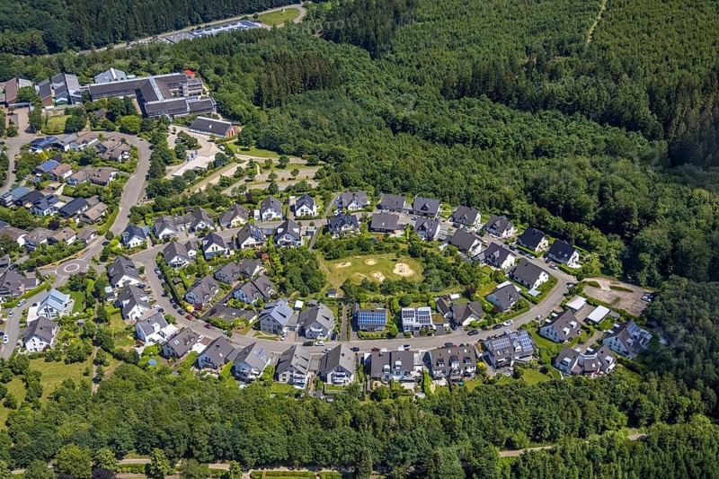 Aerial view, oval housing estate Kimicker Berg, children's playground in town centre, Manfred-Schöne-Straße, Max-von-der-Grün-Schule, Olpe-Stadt, Olpe, Sauerland, North Rhine-Westphalia, Germany, education, educational institution, DE, Europe, property tax, real estate, educational institute, aerial view, aerial photography, aerial photography, school, overview, bird's eye view, forest, housing estate, living and life, residential area, residential buildings, quality of life, residential quarter, housing estate, bird's eye view, overview