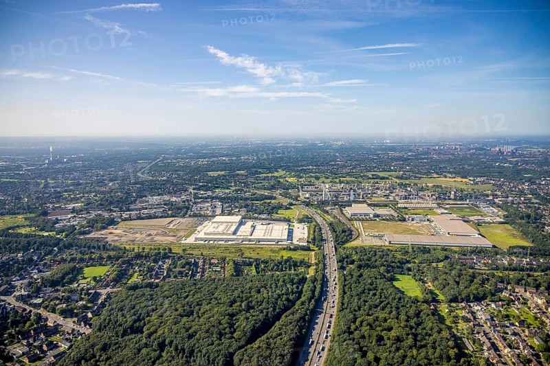 Aerial view, Edeka central warehouse Oberhausen as well as SEGRO Logistics Park Oberhausen and Lekkerland logistics centre Oberhausen and chemical plant Celanese Europe BV in the Waldteich industrial park in the Schwarze Heide district of Oberhausen, Ruhr area, North Rhine-Westphalia, Germany, A3 motorway, construction area, construction site, building plots, DE, Europe, commercial enterprises, commercial space, commercial area, commercial park, commercial location, commercial use, freight traffic, industrial area, industrial building, industrial location, logistics, logistics service, logistics service provider, logistics provider, logistics centre, aerial view, aerial photography, aerial photography, Oberhausen, SEGRO Parks, transport service, overview, bird's-eye view, overview