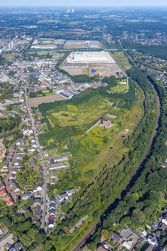 Aerial view, Sterkrade colliery with historic winding tower, Edeka central warehouse and SEGRO Logistics Park in the Schwarze Heide district of Oberhausen, Ruhr area, North Rhine-Westphalia, Germany, DE, Europe, commercial enterprises, commercial area, commercial park, Waldteich commercial park, commercial location, commercial use, freight traffic, industrial area, industrial building, industrial location, logistics, logistics service, logistics service provider, logistics provider, logistics centre, aerial view, aerial photography, aerial photography, Oberhausen, SEGRO Parks, transport service, overview, bird's eye view, colliery, birds-eyes view, overview