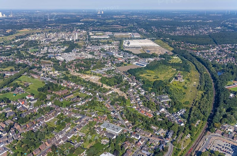 Aerial view, Sterkrade colliery with historic winding tower, Edeka central warehouse and SEGRO Logistics Park in the Schwarze Heide district of Oberhausen, Ruhr area, North Rhine-Westphalia, Germany, chemical plant, DE, Europe, commercial enterprises, commercial area, industrial estate, industrial park, industrial estate Waldteich, commercial location, commercial use, freight traffic, industrial area, industrial building, industrial site, logistics, logistics service, logistics service provider, logistics provider, logistics centre, aerial view, aerial photography, aerial photography, Oberhausen, SEGRO Parks, transport service, overview, bird's eye view, colliery, birds-eyes view, overview