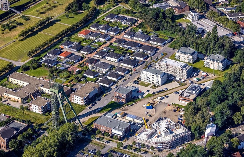 Aerial view, winding tower and Steigerhaus as well as ASO Oberhausen senior citizens' residence at OLGA Park and construction site and new residential buildings Auf dem Schacht and Vestische Straße corner Zum Steigerhaus at OLGA Park in Osterfeld, Oberhausen, Ruhr area, North Rhine-Westphalia, Germany, construction work, construction area, construction site, building plots, construction project, construction site, DE, Europe, property tax, real estate, aerial view, aerial photography, aerial photography, new construction, overview, bird's-eye view, residential complex, living and living, residential area, residential buildings, residential quality, residential neighbourhood, housing estate, birds-eyes view, overview