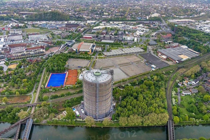 Aerial view, gasometer venue, Borbeck, Oberhausen, Ruhr area, North Rhine-Westphalia, Germany, exhibitions, DE, shopping centre, shopping mall, Europe, leisure centre, hockey fields, culture, art, aerial view, aerial photography, aerial photography, Neue Mitte, panoramic view, shopping centre, sports, sports field OTHC Oberhausener Tennis Hockey-Club, decommissioned gas holder, tennis, tennis facility, tennis courts, overview, events, venue, bird's-eye view, birds-eyes view, former gas holder, cultural use, overview