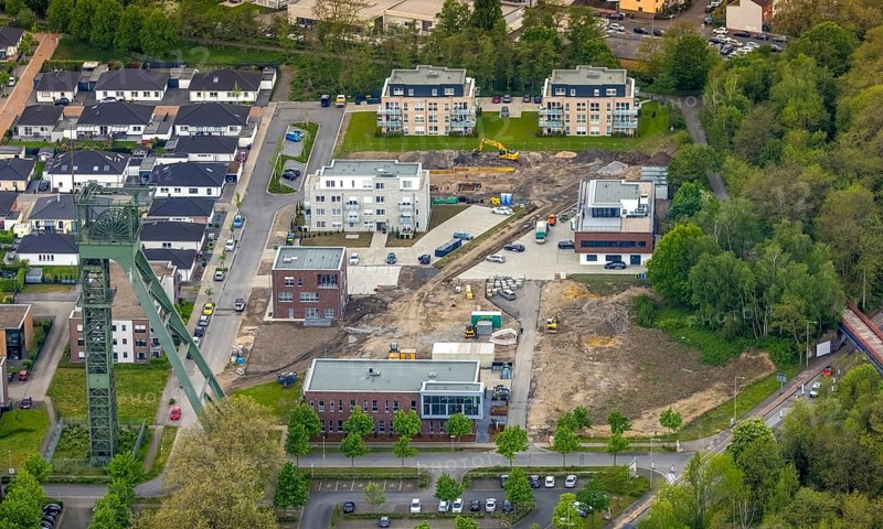 Aerial view, winding tower Osterfeld colliery, shaft complex Â½, new residential complex and office building Auf dem Schacht, Am Steigerhaus, Osterfeld, Oberhausen, Ruhr area, North Rhine-Westphalia, Germany, construction work, construction area, construction site, building plots, construction project, construction site, DE, Europe, winding tower, property tax, real estate, aerial view, aerial photography, aerial photography, new building, overview, bird's-eye view, housing estate, housing and living, residential area, residential buildings, residential quality, residential neighbourhood, housing estate, birds-eyes view, overview