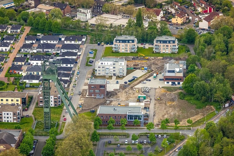 Aerial view, winding tower Osterfeld colliery, shaft complex Â½, new residential complex and office building Auf dem Schacht, Am Steigerhaus, Osterfeld, Oberhausen, Ruhr area, North Rhine-Westphalia, Germany, construction work, construction area, construction site, building plots, construction project, construction site, DE, Europe, winding tower, property tax, real estate, aerial view, aerial photography, aerial photography, new building, overview, bird's-eye view, housing estate, housing and living, residential area, residential buildings, residential quality, residential neighbourhood, housing estate, birds-eyes view, overview