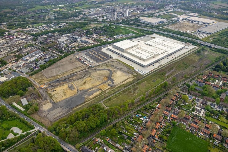 Aerial view, Edeka central warehouse logistics centre, Logport V, LLogport 5, Waldteich, Schwarze Heide, Oberhausen, Ruhr area, North Rhine-Westphalia, Germany, A3 motorway, construction area, building site, building plots, building land, construction project, DE, Edeka Rhein-Ruhr, Europe, commercial enterprises, commercial area, commercial park, commercial location, commercial use, freight traffic, industrial area, industrial location, logistics, logistics service, logistics service provider, logistics provider, logistics centre, aerial view, aerial photography, aerial photography, freight forwarding, transport, transport service, overview, bird's-eye view, Waldteichstraße, birds-eyes view, overview