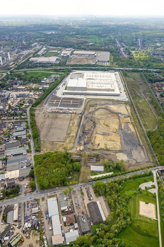 Aerial view, Edeka central warehouse logistics centre, Logport V, LLogport 5, Waldteich, Schwarze Heide, Oberhausen, Ruhr area, North Rhine-Westphalia, Germany, A3 motorway, construction area, building site, building plots, building land, construction project, DE, Edeka Rhein-Ruhr, Europe, commercial enterprises, commercial area, commercial park, commercial location, commercial use, freight traffic, industrial area, industrial location, logistics, logistics service, logistics service provider, logistics provider, logistics centre, aerial view, aerial photography, aerial photography, freight forwarding, transport, transport service, overview, bird's-eye view, Waldteichstraße, birds-eyes view, overview