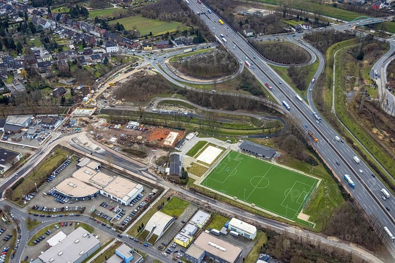 Aerial view, A3 motorway junction Oberhausen-Holten, construction site feeder road, Schwarze Heide, Oberhausen, Ruhr area, North Rhine-Westphalia, Germany, A3 motorway, motorway junction, construction work, construction area, building site, building plots, construction project, construction site, DE, Europe, football pitch, aerial view, aerial photography, aerial photography, new building, sports field, TV Biefang 1912, overview, bird's-eye view, overview