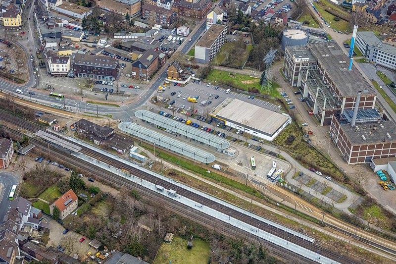 Aerial view, railway station and bus station, biomass cogeneration plant of Energieversorgung Oberhausen AG, Sterkrade Mitte, Oberhausen, Ruhr area, North Rhine-Westphalia, Germany, railway tracks, railway station, bus stop, DE, Deutsche Bahn AG, Europe, main station, power station, aerial view, aerial photography, aerial photography, overview, bird's eye view, ZOB, birds-eyes view, overview