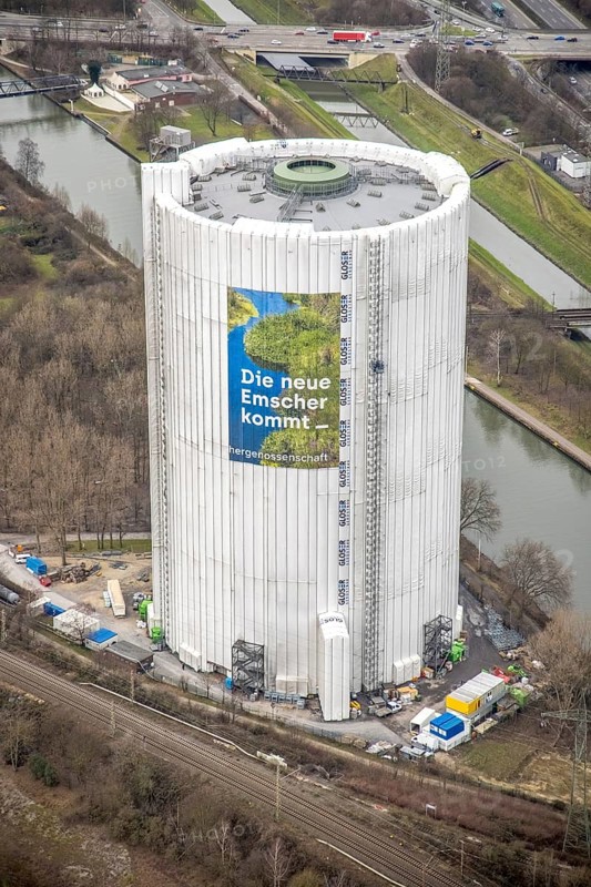 Aerial view, gasometer renovation measures, covered gasometer at CentrO, poster The Emscher is coming, Rhine-Herne Canal. River Emscher, Borbeck, Oberhausen, Ruhr area, North Rhine-Westphalia, Germany, DE, Europe, industrial monument, culture, art, aerial view, aerial photography, aerial photography, overview, events, venue, event location, event centre, bird's eye view, birds-eyes view, cultural use, overview