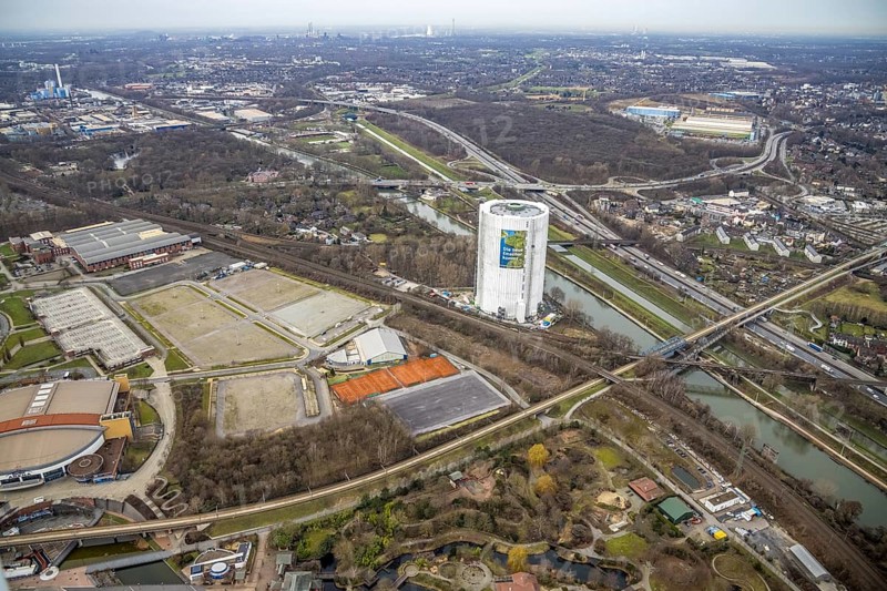 Aerial view, gasometer renovation measures, covered gasometer at CentrO, poster The Emscher is coming, Rhine-Herne Canal. River Emscher, Borbeck, Oberhausen, Ruhr area, North Rhine-Westphalia, Germany, DE, Europe, industrial monument, culture, art, aerial view, aerial photography, aerial photography, overview, events, venue, event location, event centre, bird's eye view, birds-eyes view, cultural use, overview