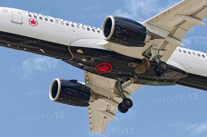 Passenger plane with deployed landing gear, Montreal, Province of Quebec, Canada
