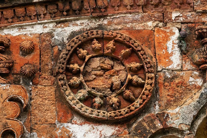 Intricate circular stone design in ancient architecture with detailed carvings-Dhaka, Bangladesh