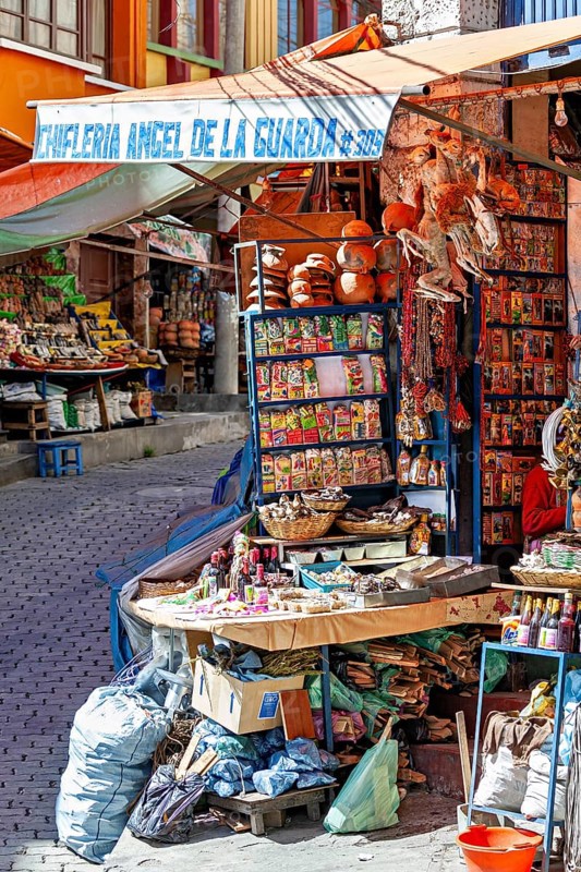 A stall at an Andean market with spices and colourful packaging, traditionally decorated, The witches' market of La Paz in Bolivia