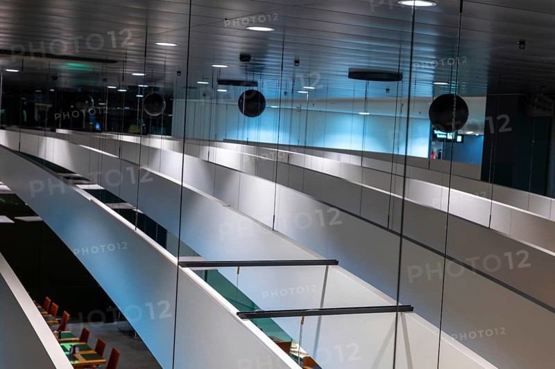 Restaurant and Ceiling Illuminated Inside the Zurich Airport at Night in the Airport in Kloten, Zurich, Zurich Canton, Switzerland