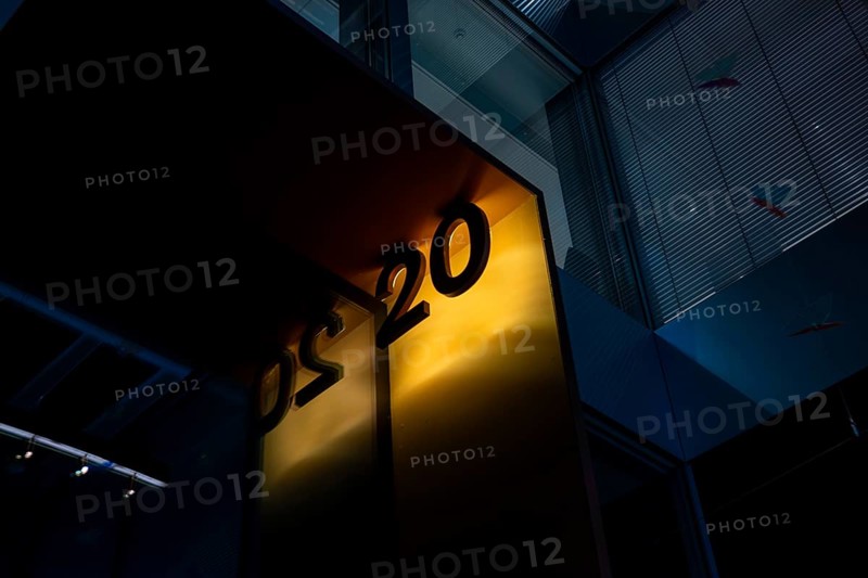 Illuminated Street Sign Number Twenty on Modern Building in Zurich, Zurich canton, Switzerland