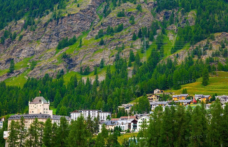 Luxury Hotel in the Forest with Mountain View in the Swiss Alps in a Sunny Summer Day in Pontresina, Maloja, Grisons, Switzerland
