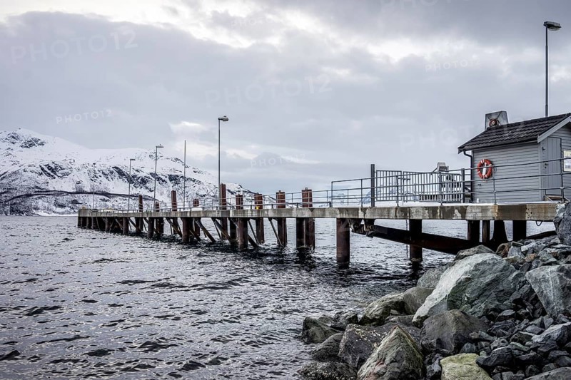 Norway tromsö snow mountains sea house jetty