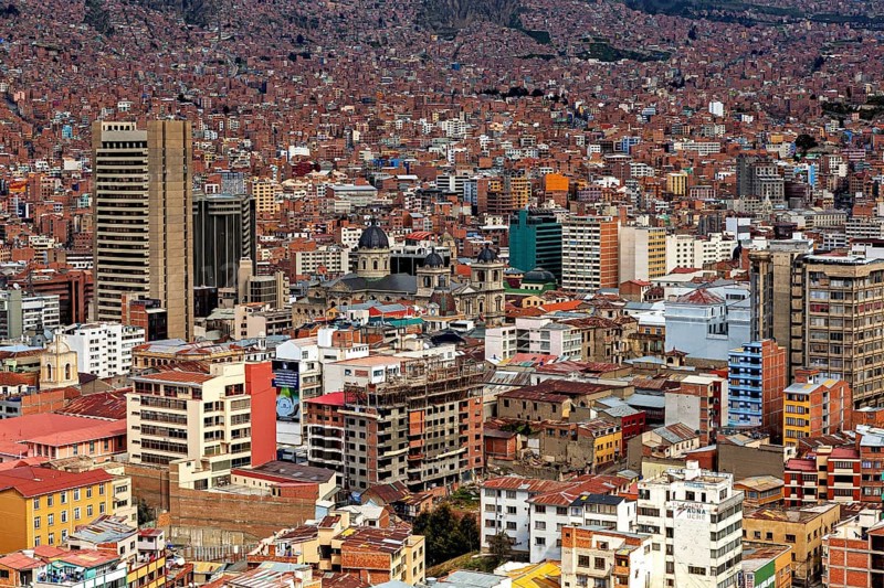 View over the densely populated city of La Paz with many different buildings, The houses and skyscrapers of the city centre of La Paz in Bolivia