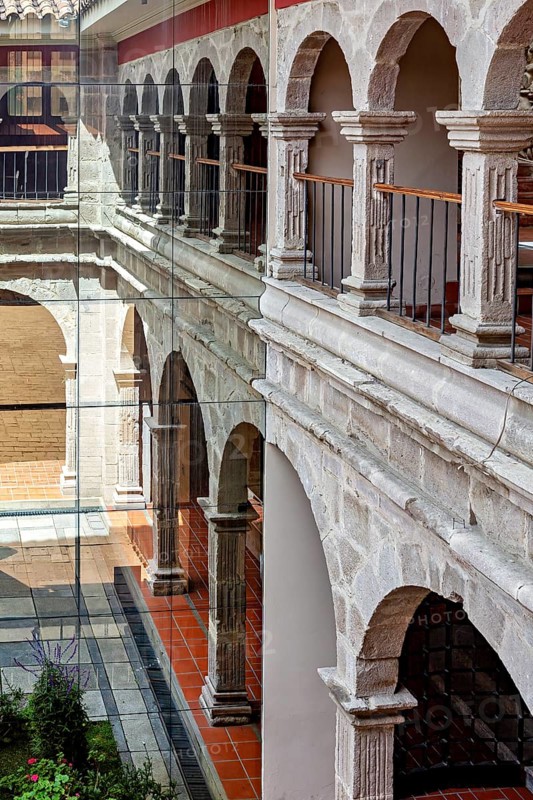 Historic courtyard with classic stone arches and modern glass design, San Fransisco Cathedral in La Paz Bolivia