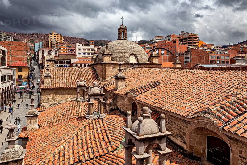 Urban view with church and historical buildings under a cloudy sky, The Cathedral of San Fransisco in La Paz Bolivia