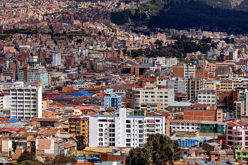Urban panorama with surrounding mountains and numerous buildings, The houses and skyscrapers of the city centre of La Paz in Bolivia