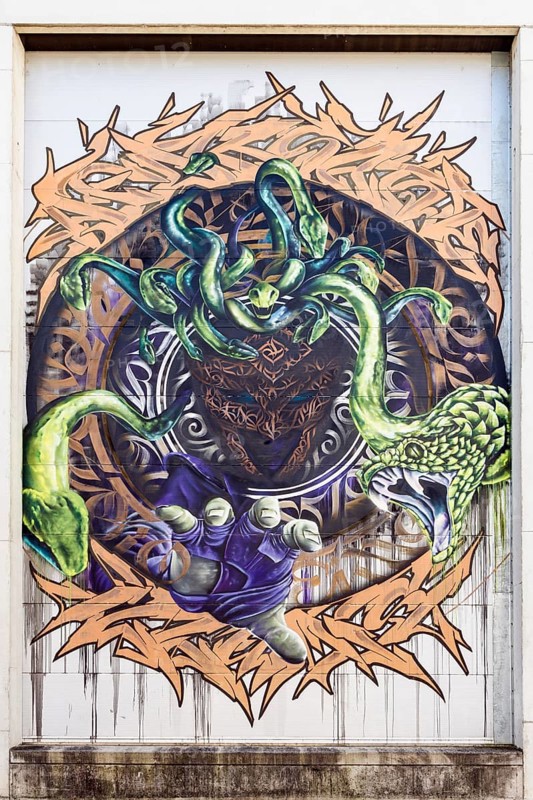 Mythical motif with Medusa and several snakes in a circular design, at Linz harbour Upper Austria Austria