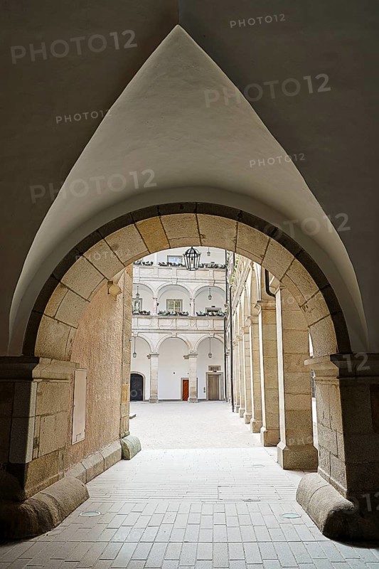 Arched passageway to an inner courtyard in a historic stone building, Arkardenhof Landhaus Linz Upper Austria Austria