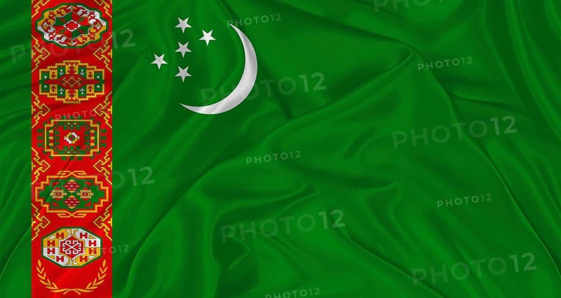 Flag of Turkmenistan with cloth texture. Close up of Turkmenistan flag waving