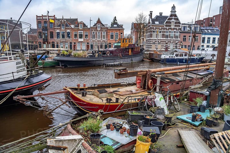 Houseboats on a canal in Groningen, Netherlands