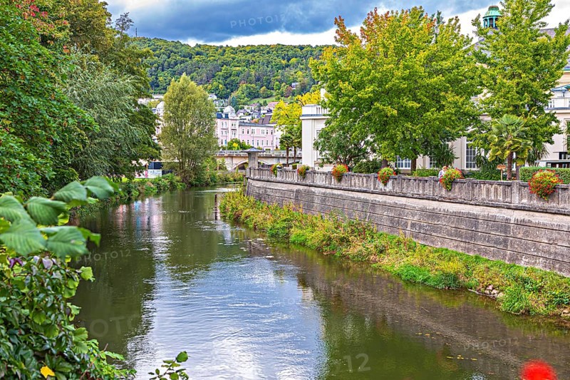 Promenade and arcade footbridge on the Franconian Saale in Bad Kissingen, Bavaria, Germany
