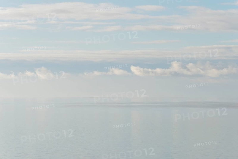 North Sea coast, special light atmosphere over the Wadden Sea with rising water and calm wind, Norddeich, Lower Saxony, Germany