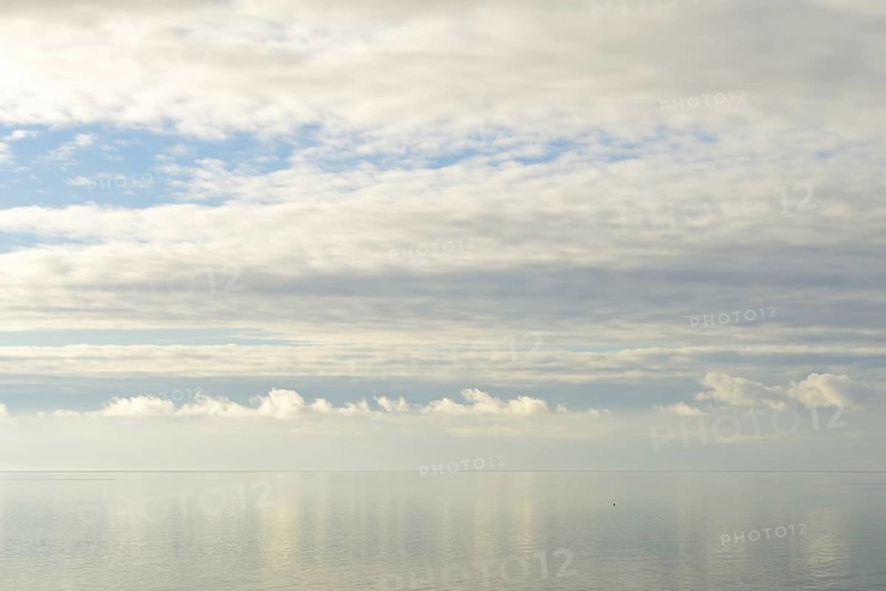 North Sea coast, special light atmosphere over the Wadden Sea with rising water and calm wind, Norddeich, Lower Saxony, Germany