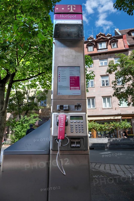 Telekom public telephone pillar, Nuremberg, Central Franconia, Bavaria, Germany