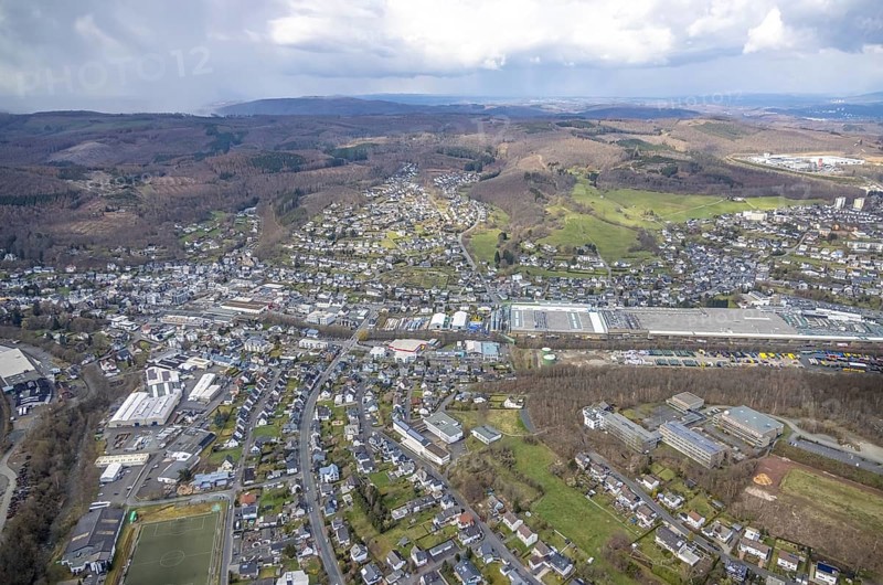 Downtown Kölner Straße, Salchendorf, Neunkirchen, Siegerland, North Rhine-Westphalia, Germany, authority, education, educational institution, DE, shopping markets, shopping centre, Europe, primary school, primary school Neunkirchen, property tax, hilly landscape, real estate, educational institute, aerial view, aerial photograph, aerial photography, aerial photography, local supply centre, town hall, Rewe supermarket, school, overview, bird's eye view, living and working, living and life, residential area, residential buildings, birds-eyes view, overview