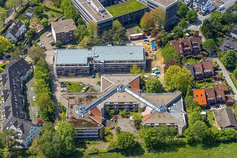 Aerial view, construction site and new building at evang. Wohnstift Raadt, Holthausen - Südost, Mülheim an der Ruhr, Ruhr area, North Rhine-Westphalia, Germany, retirement home, old people's home, construction work, construction area, building site, building plots, construction project, construction site, care and nursing, DE, Europe, aerial view, aerial photography, aerial photography, new building, Parsevalstraße, care facility, retirement home, retirement residence, retirement home, retirement centre, overview, bird's eye view, bird's eye view, overview