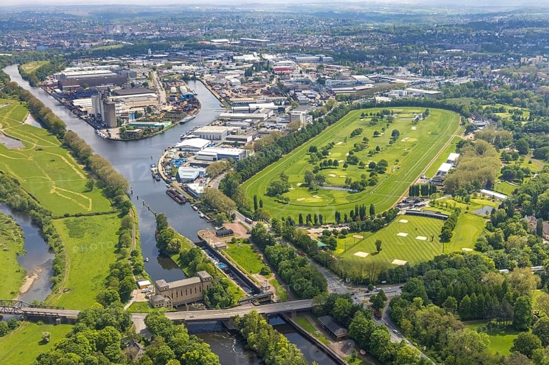 Aerial view, Raffelberg racecourse with golf course inside, Raffelberg lock, Raffelberg hydroelectric power station, Raffelberg bridge, Speldorf - Northwest, Mülheim an der Ruhr, Ruhr area, North Rhine-Westphalia, Germany, Akazienallee, bridge, DE, Europe, golf, golf course, golf club, Raffelberg golf club, golf course, golf meadow, power station, aerial view, aerial photography, aerial photography, equestrian sports, racecourse, Ruhrorter Straße, sport, overview, bird's-eye view, birds-eyes view, overview