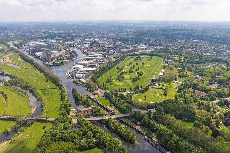 Aerial view, Raffelberg racecourse with golf course inside, Raffelberg lock, Raffelberg hydroelectric power station, Raffelberg bridge, Speldorf - Northwest, Mülheim an der Ruhr, Ruhr area, North Rhine-Westphalia, Germany, Akazienallee, bridge, DE, Europe, golf, golf course, golf club, Raffelberg golf club, golf course, golf meadow, power station, aerial view, aerial photography, aerial photography, equestrian sports, racecourse, Ruhrorter Straße, sport, overview, bird's-eye view, birds-eyes view, overview