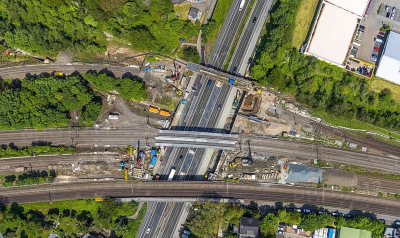 Aerial view, construction site after bridge fire motorway 40, renovation of railway bridges, Styrum, Mülheim an der Ruhr, Ruhr area, North Rhine-Westphalia, Germany, motorway A40, construction work, construction area, construction site, construction crane, construction measure, construction site, bridge, DE, railway bridge, renovation, Europe, aerial view, aerial photography, aerial photography, renovation, closure, tanker accident, overview, bird's eye view, bird's eye view, overview