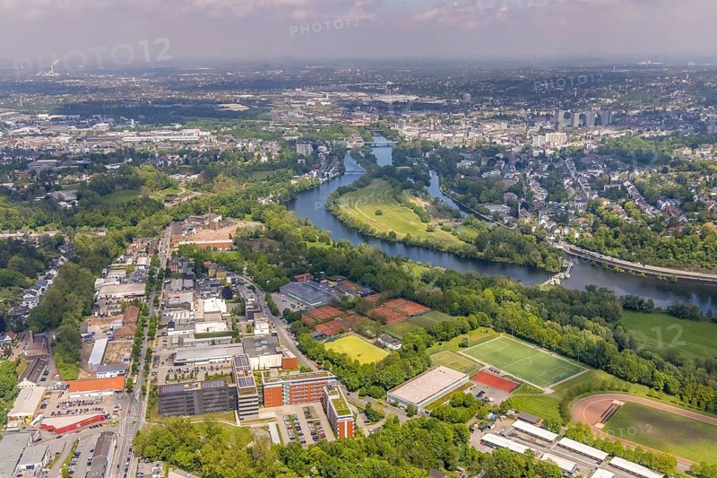 Aerial view, ALDI International Services GmbH company campus, RWW Kahlenberg hydroelectric power station, Ruhrinsel, Saarner Ruhraue sports park, Saarn, Mülheim an der Ruhr, Ruhr area, North Rhine-Westphalia, Germany, Aldi Süd, DE, Europe, football pitch, football stadium, commercial enterprises, commercial area, commercial site, commercial use, industrial area, industrial building, industrial site, aerial view, aerial photography, aerial photography, Mintarder Straße, photovoltaic, photovoltaic system, solar, solar system, solar energy, solar energy, sports, sports facilities, sports field, sports facility, tennis, tennis facility, tennis courts, overview, bird's-eye view, overview