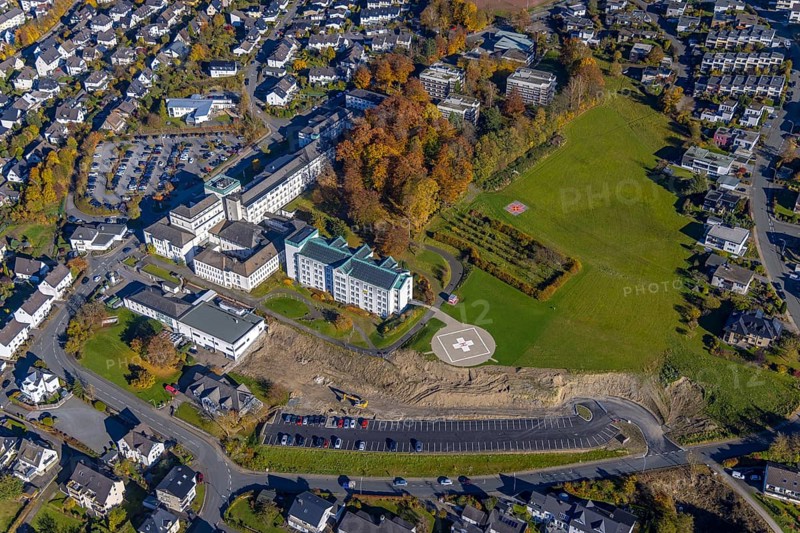 Aerial view, construction area at St. Walburga-Krankenhaus Meschede in Meschede-Stadt in Meschede, Sauerland, North Rhine-Westphalia, Germany, construction work, construction area, building site, building plots, construction project, construction site, DE, Europe, healthcare, hospital, helipad, clinic, clinic centre, hospital, aerial photograph, aerial photography, aerial photography, medical facility, medical aid, Meschede, overview, bird's eye view, birds-eyes view, overview, medical care