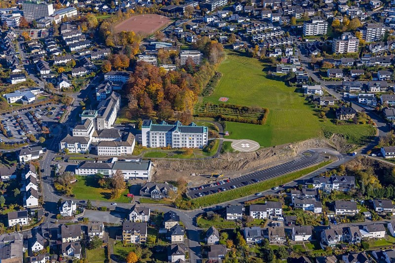 Aerial view, construction area at St. Walburga-Krankenhaus Meschede in Meschede-Stadt in Meschede, Sauerland, North Rhine-Westphalia, Germany, construction work, construction area, building site, building plots, construction project, construction site, DE, Europe, healthcare, hospital, helipad, clinic, clinic centre, hospital, aerial photograph, aerial photography, aerial photography, medical facility, medical aid, Meschede, overview, bird's eye view, birds-eyes view, overview, medical care