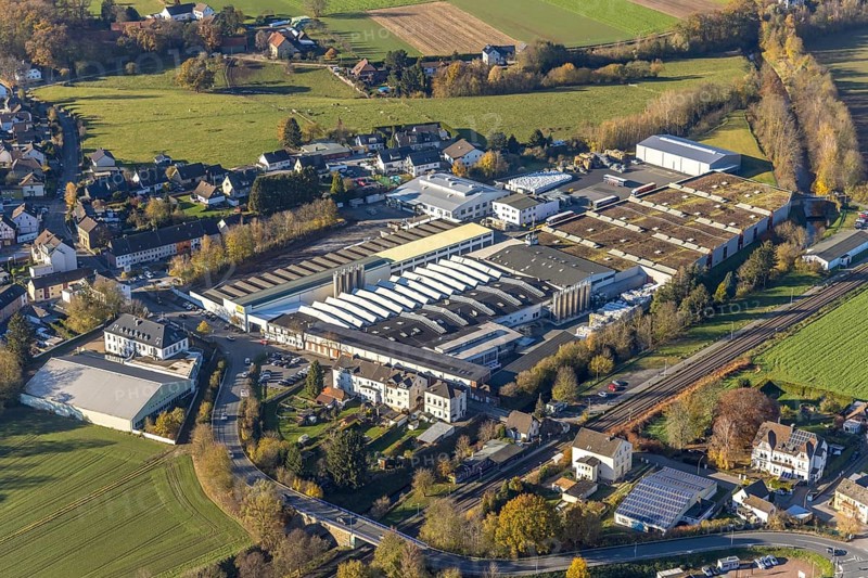 Aerial view, OBO Bettermann company premises in the Fröndenberger Straße industrial estate and Menden-Bösperde railway station in the Bösperde district of Menden, Sauerland, North Rhine-Westphalia, Germany, railway station, DE, Deutsche Bahn AG, Europe, commercial enterprises, commercial area, industrial estate, business park, commercial location, commercial use, industrial estate, industrial building, industrial location, aerial photograph, aerial photography, aerial photography, Menden, overview, bird's-eye view, bird's-eye view, overview