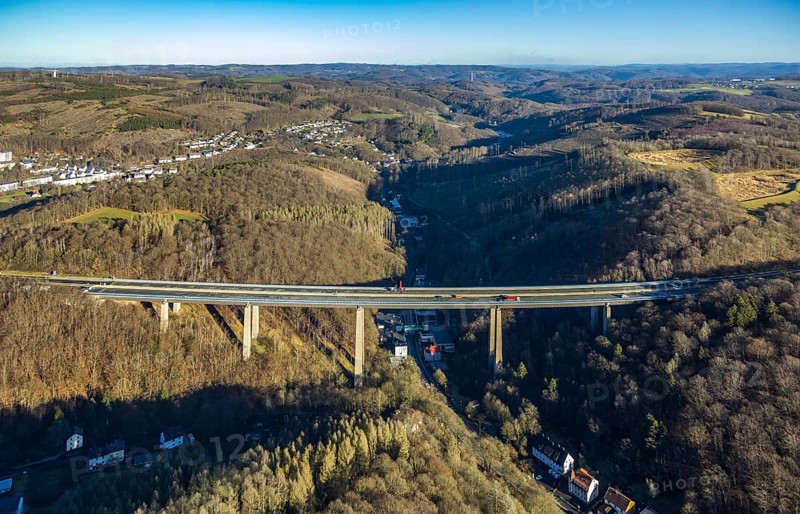 Aerial photograph, construction work with emergency reinforcement on the dilapidated and closed Rahmede viaduct of the A45 Sauerlandlinie motorway over Altenaer Straße in the Gevelndorf district of Lüdenscheid, Sauerland, North Rhine-Westphalia, Germany, A45, construction work, construction measure, construction site, DE, Europe, aerial photograph, aerial photography, aerial photography, Lüdenscheid, emergency reinforcement, through road, Rahmede valley bridge, Sauerland line, closure of the Rahmede valley bridge, traffic jam, traffic jams, overview, traffic chaos, traffic infrastructure, traffic jam, bird's eye view, forest area, birds-eyes view, lack of load-bearing capacity, dilapidated bridge, dilapidated bridges, overview