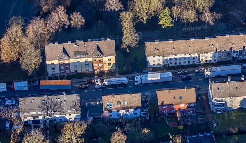 Aerial view, through road with truck traffic jam on the Lennestraße at the exit Lüdenscheid of the motorway A45 Sauerlandlinie because of the closed viaduct Rahmede in the district Leifringhausen in Lüdenscheid, Sauerland, North Rhine-Westphalia, Germany, A45, motorway junction, DE, Europe, truck traffic jam, aerial view, aerial photography, aerial photography, Lüdenscheid, through road, Sauerlandlinie, closure of the Rahmede viaduct, traffic jam, traffic jam, road traffic, overview, diversion, traffic volume, traffic chaos, traffic infrastructure, traffic jam, bird's eye view, birds-eyes view, dilapidated bridge, dilapidated bridges, overview