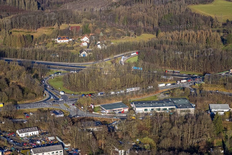 Aerial view, truck traffic jam at the Lüdenscheid exit of the A45 Sauerlandlinie motorway due to the closure of the Rahmede viaduct in the Leifringhausen district of Lüdenscheid, Sauerland, North Rhine-Westphalia, Germany, A45, motorway junction, Brunscheider Straße, DE, Europe, truck traffic jam, aerial view, aerial photography, aerial photography, Lüdenscheid, through road, Sauerlandlinie, closure of the Rahmede viaduct, traffic jam, traffic jam, road traffic, overview, diversion, traffic volume, traffic chaos, traffic infrastructure, traffic jam, bird's eye view, birds-eyes view, closed Rahmede viaduct, dilapidated bridge, dilapidated bridges, overview