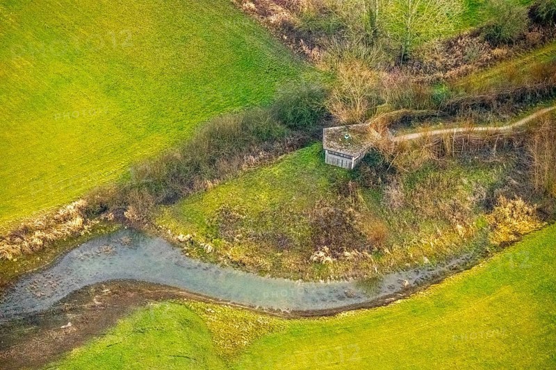 Aerial view of the national nature reserve Lippeauen at the river Lippe with the observation hut Disselmersch near Heintrop in Lippetal in North Rhine-Westphalia, Germany. Geese fly over the river Lippe, Lippetal, Ruhr area, North Rhine-Westphalia, Germany, DE, Europe, aerial photograph, birds-eyes view, aerial photography, aerial photography, overview, bird's eye view