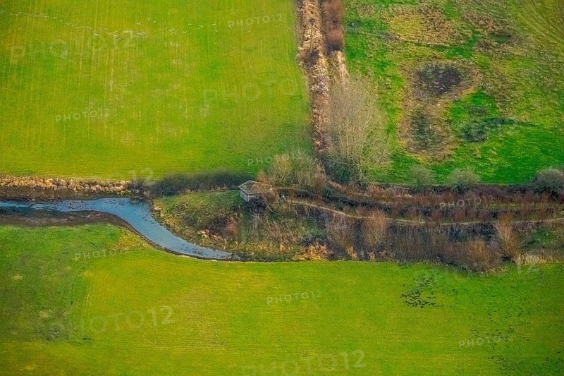 Aerial view of the national nature reserve Lippeauen at the river Lippe with the observation hut Disselmersch near Heintrop in Lippetal in North Rhine-Westphalia, Germany. Geese fly over the river Lippe, Lippetal, Ruhr area, North Rhine-Westphalia, Germany, DE, Europe, aerial photo, birds-eyes view, aerial photography, aerial photography, overview, bird's eye view