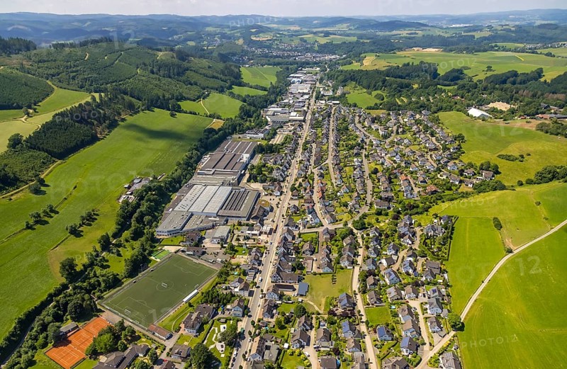 Aerial view, aerial view Elspe with commercial area Bielefelder Straße and sports field Elspe, Lennestadt, Sauerland, North Rhine-Westphalia, Germany, DEU, Europe, football pitch, football stadium, commercial enterprises, commercial area, commercial park, commercial location, commercial use, industrial area, industrial building, industrial location, aerial view, aerial photography, aerial photography, sports, sports facilities, sports field, sports facility, overview, bird's eye view, birds-eyes view, overview