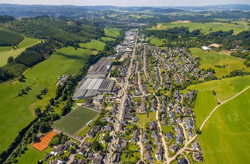 Aerial view, aerial view Elspe with commercial area Bielefelder Straße and sports field Elspe, Lennestadt, Sauerland, North Rhine-Westphalia, Germany, DEU, Europe, football pitch, football stadium, commercial enterprises, commercial area, commercial park, commercial location, commercial use, industrial area, industrial building, industrial location, aerial view, aerial photography, aerial photography, sports, sports facilities, sports field, sports facility, overview, bird's eye view, birds-eyes view, overview